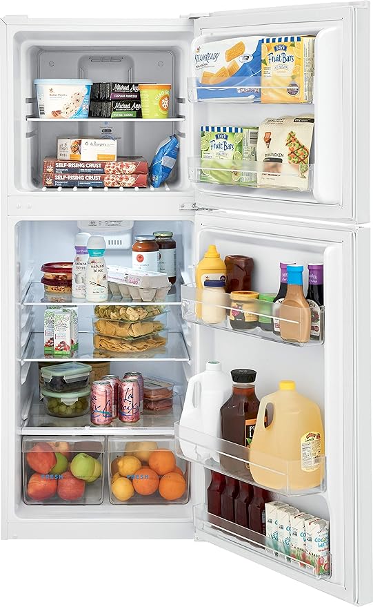Frigidaire 11.6 cu ft top freezer refrigerator with a brushed steel finish, electronic control panel, and reversible door swing for compact spaces.